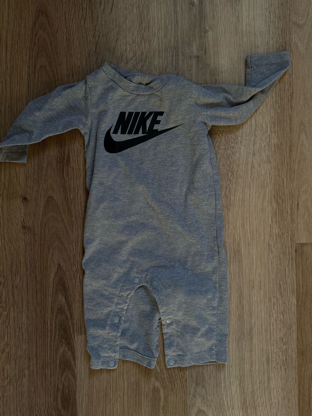 Nike Gray Long-Sleeve Baby One-Piece with Swoosh